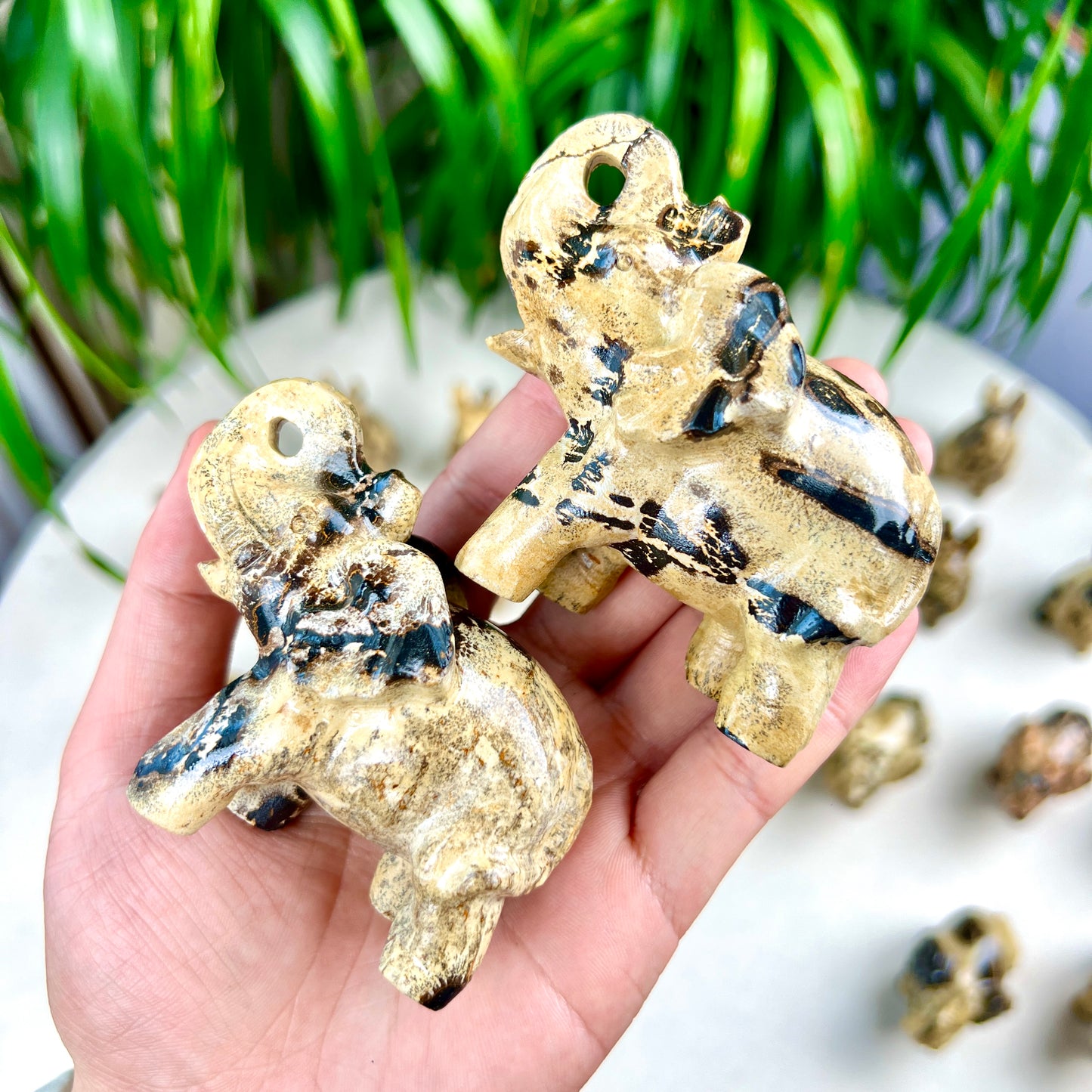 painting stone elephant and rabbite